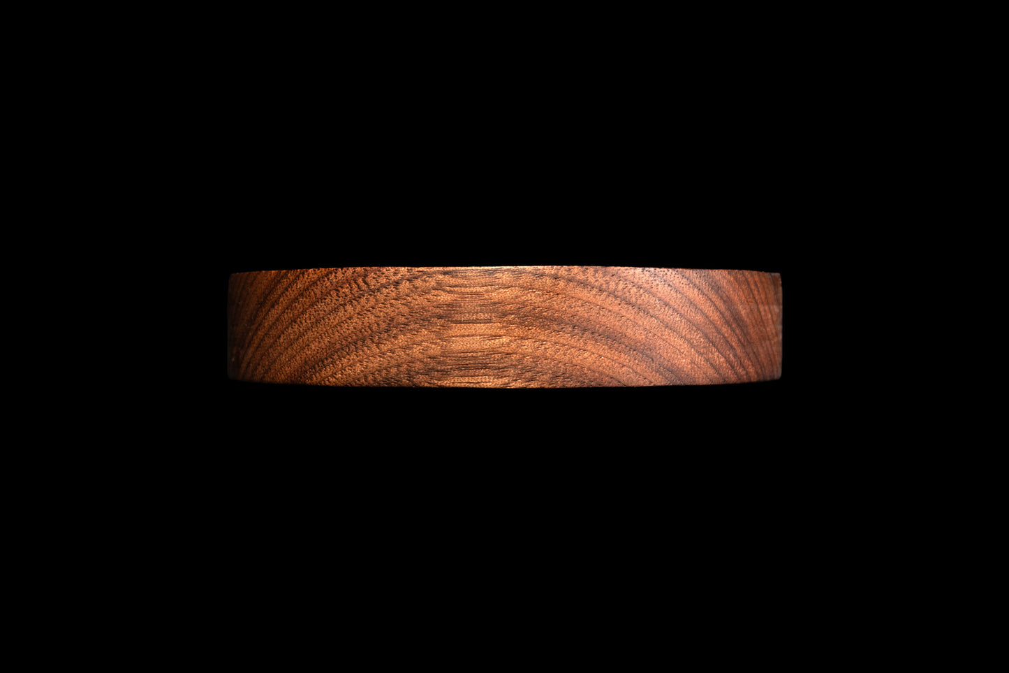 Dark circular spoon rest profile