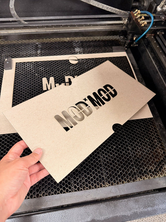 MODxMOD logo cut on a laser cutter
