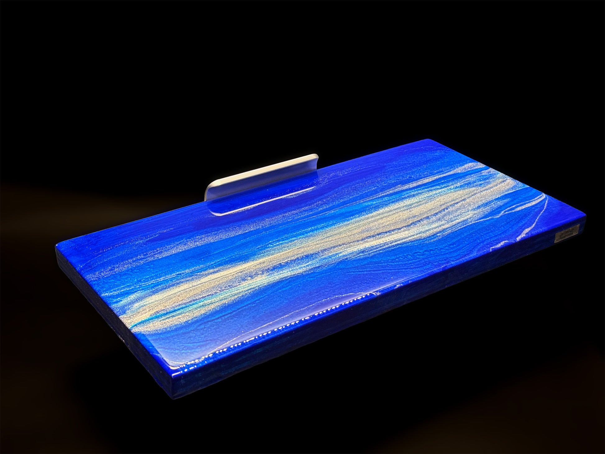 Modern furniture piece with a blue abstract waves design