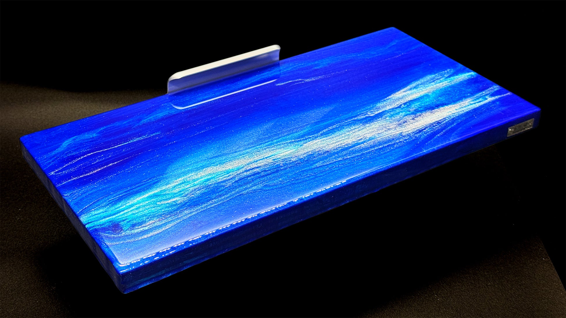 Modern furniture piece with a blue abstract waves design