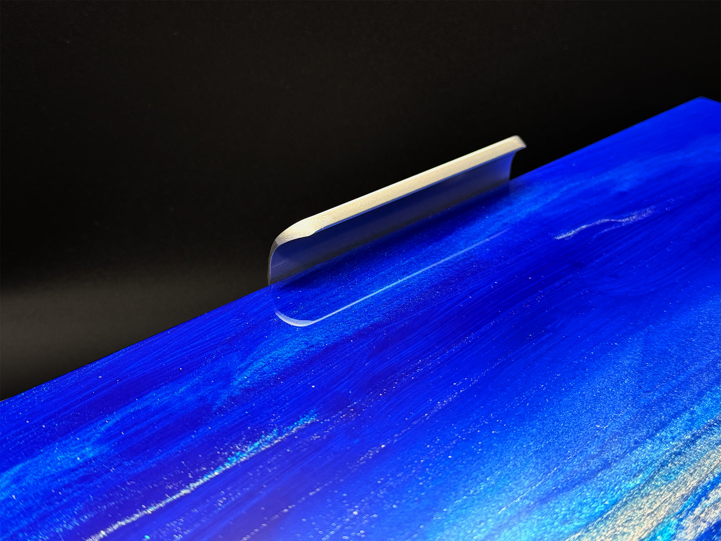 Close up of metal handle on the art piece