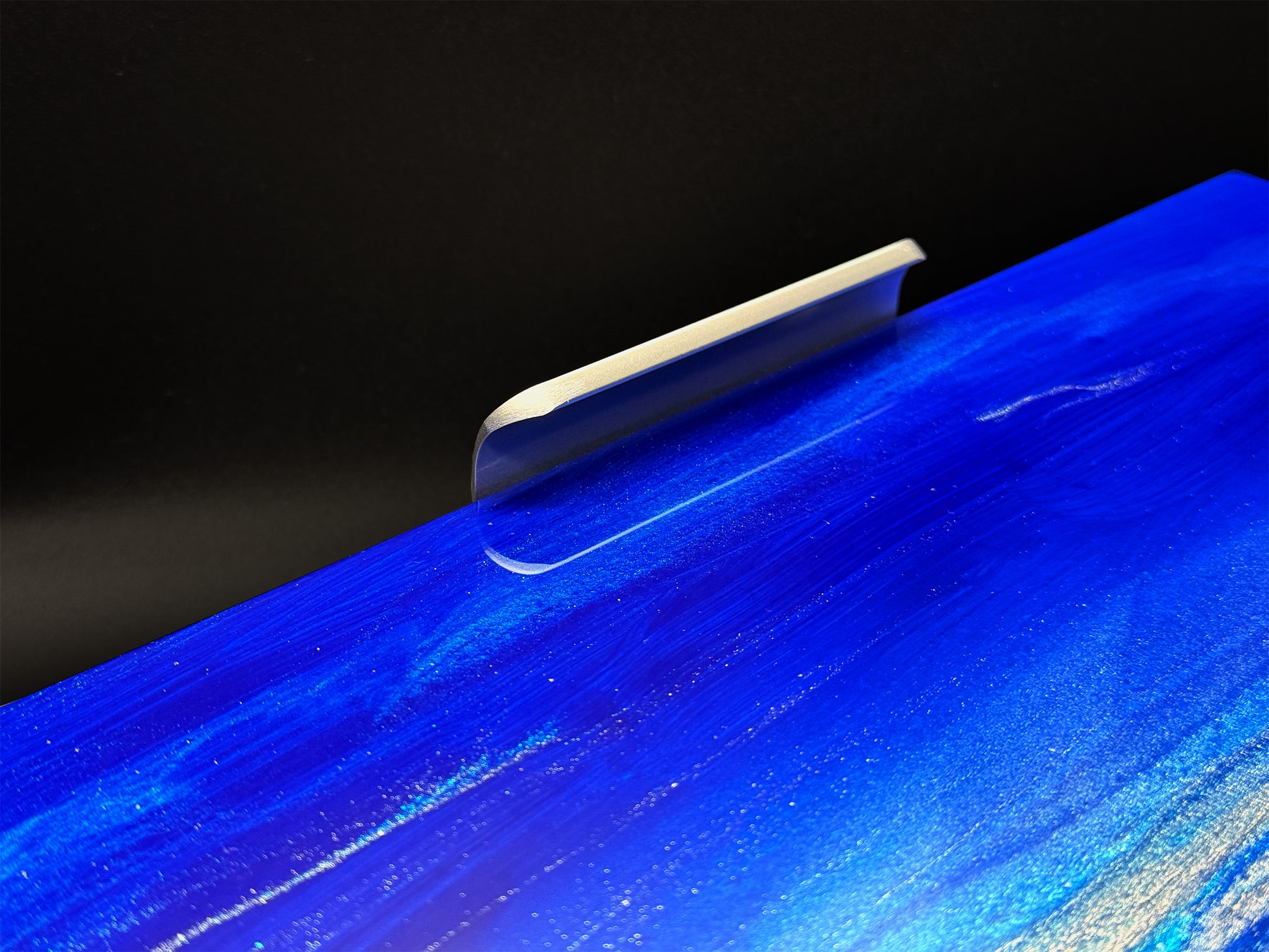 Close up of metal handle on the art piece