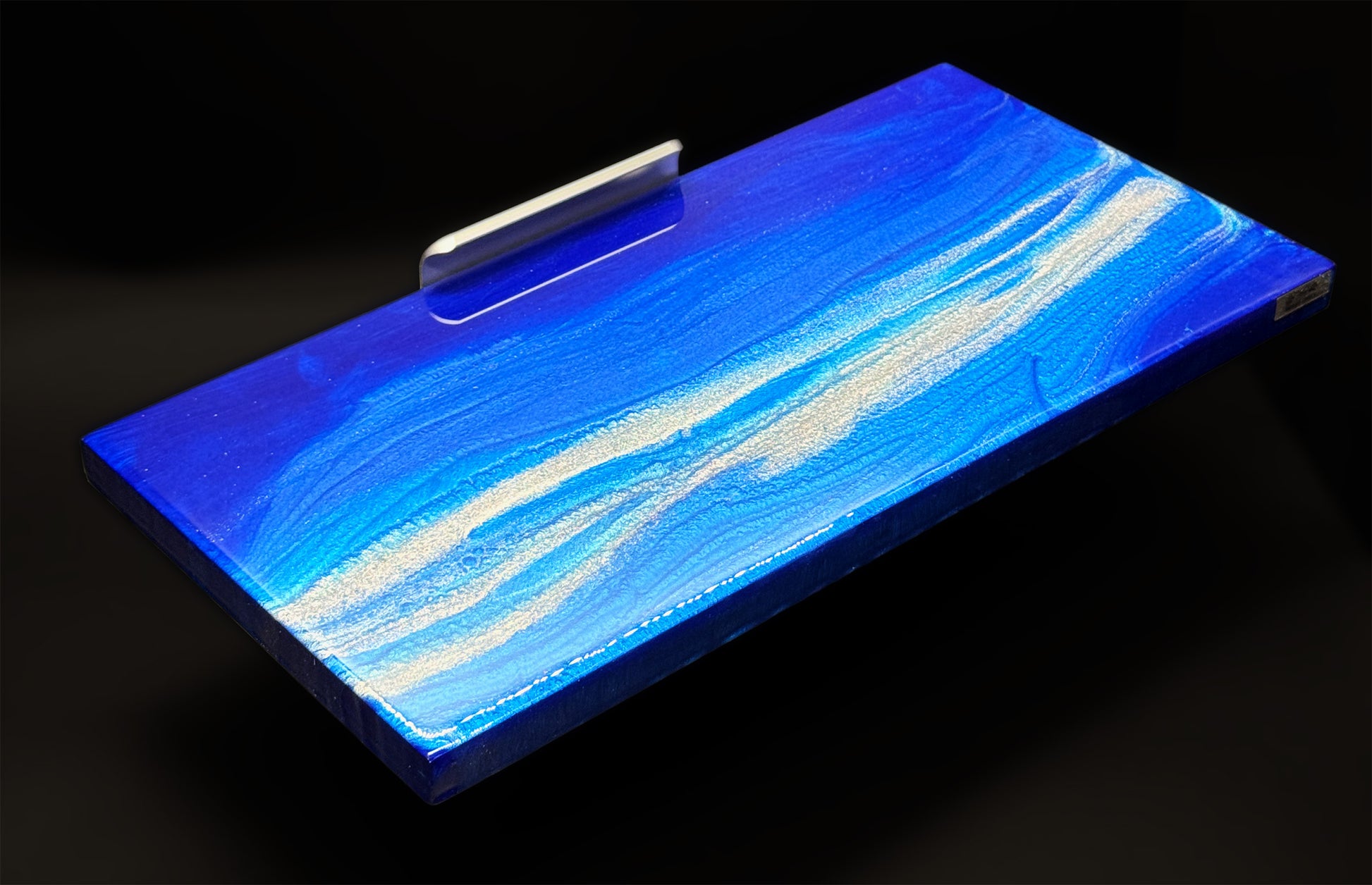Modern furniture piece with a blue abstract waves design