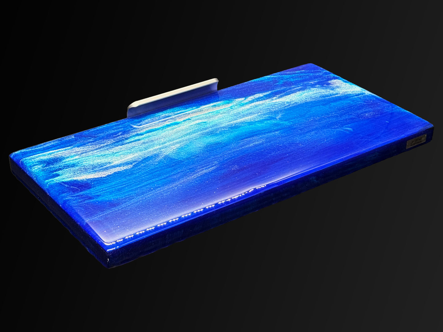 Modern furniture piece with a blue abstract waves design