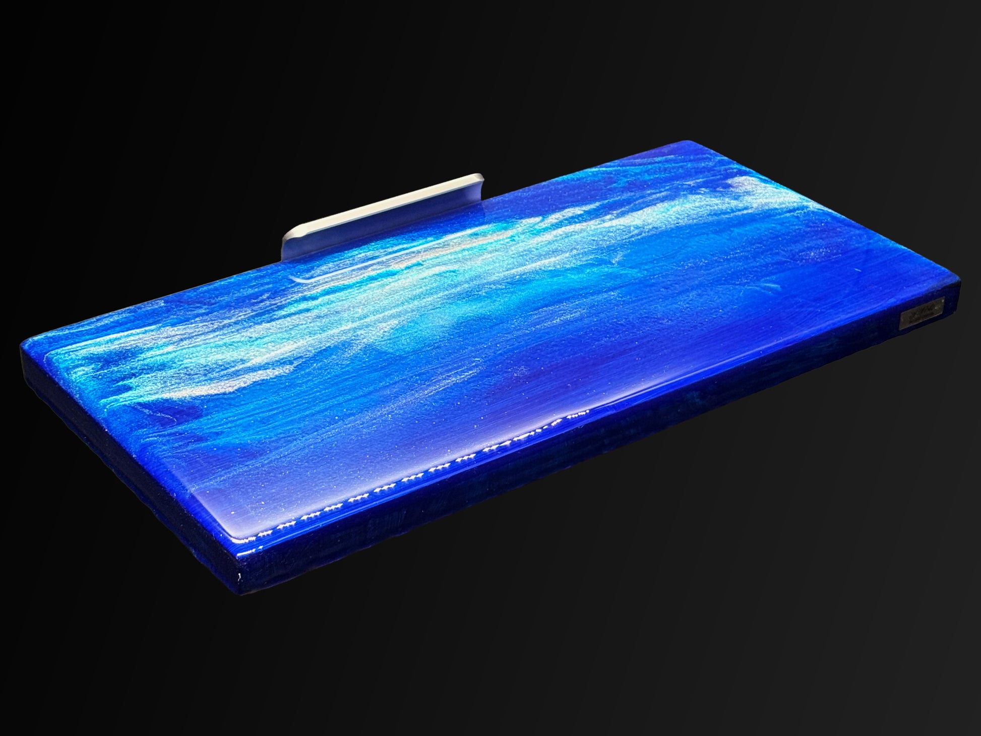 Modern furniture piece with a blue abstract waves design