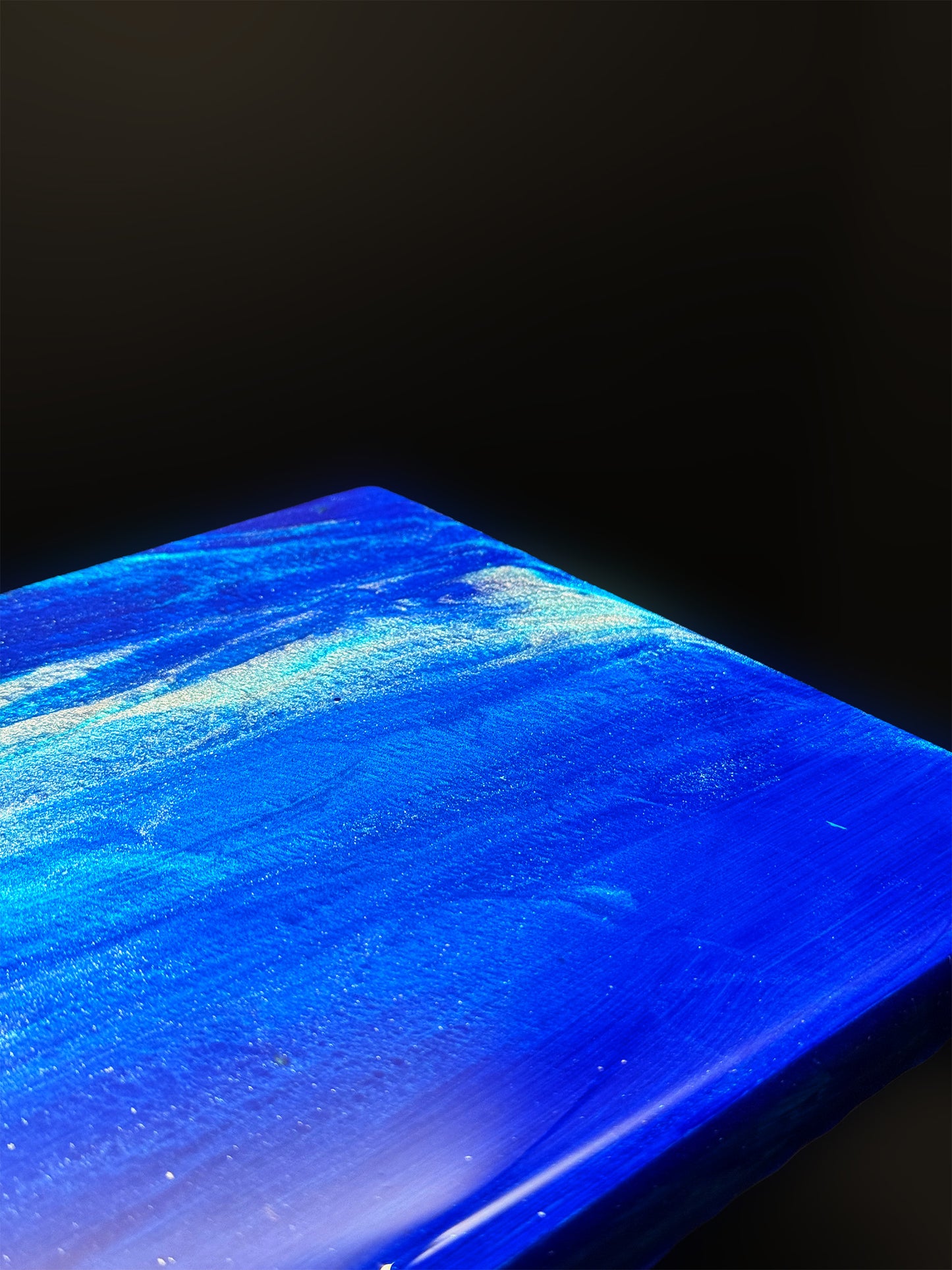 Modern furniture piece with a blue abstract waves design