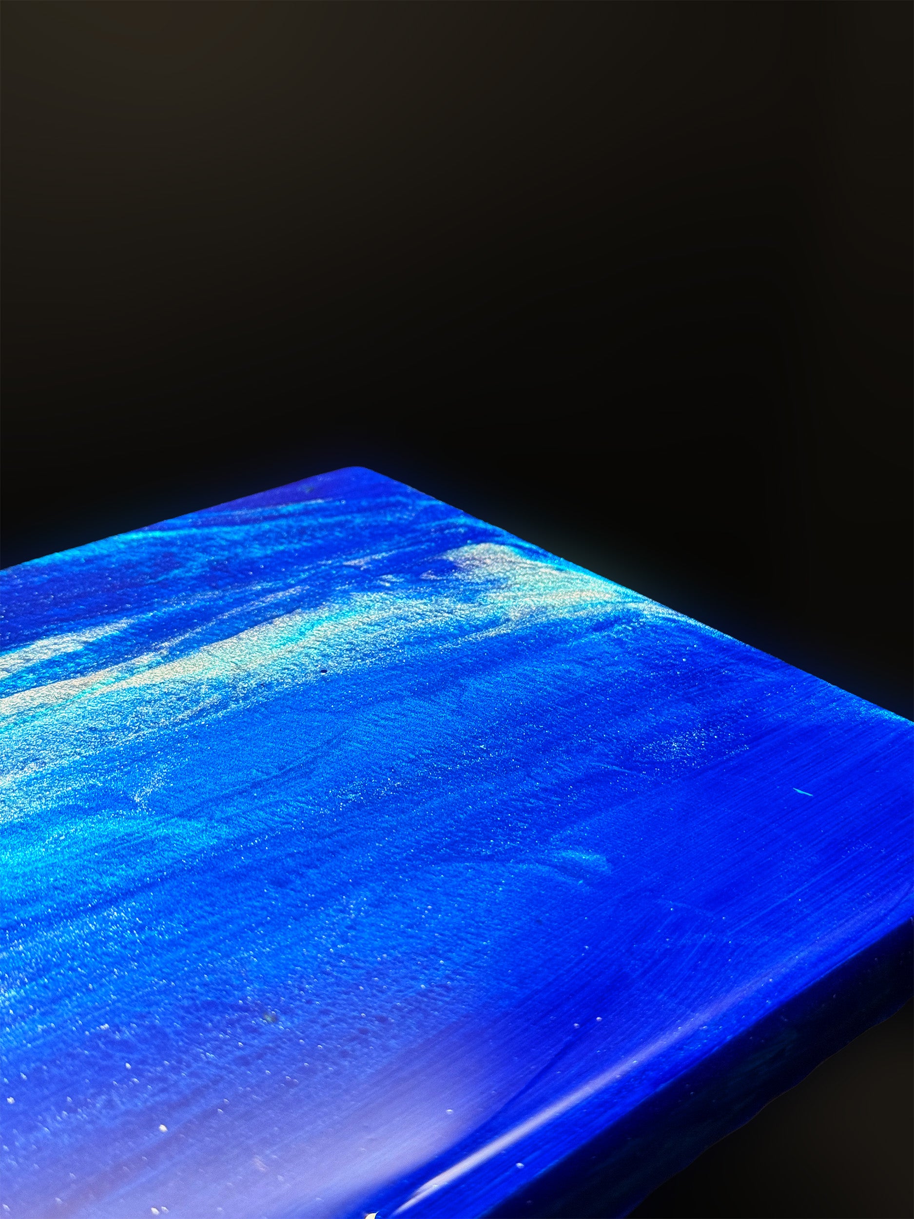 Modern furniture piece with a blue abstract waves design