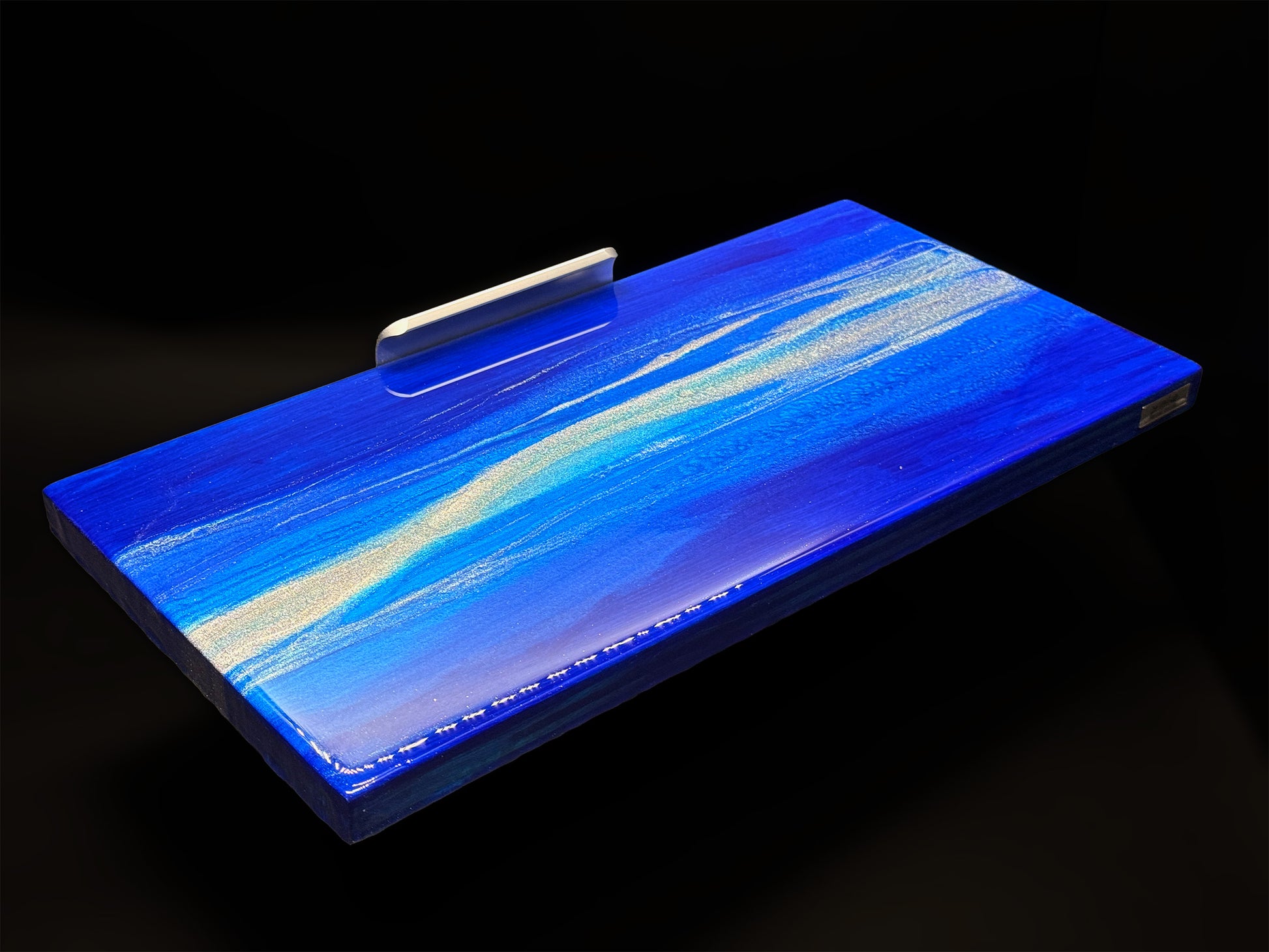 Modern furniture piece with a blue abstract waves design