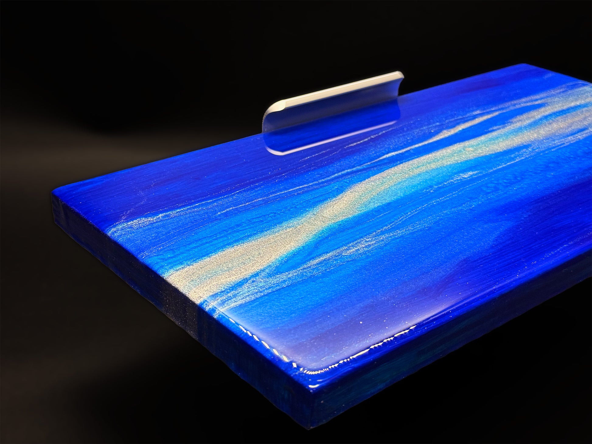 Modern furniture piece with a blue abstract waves design