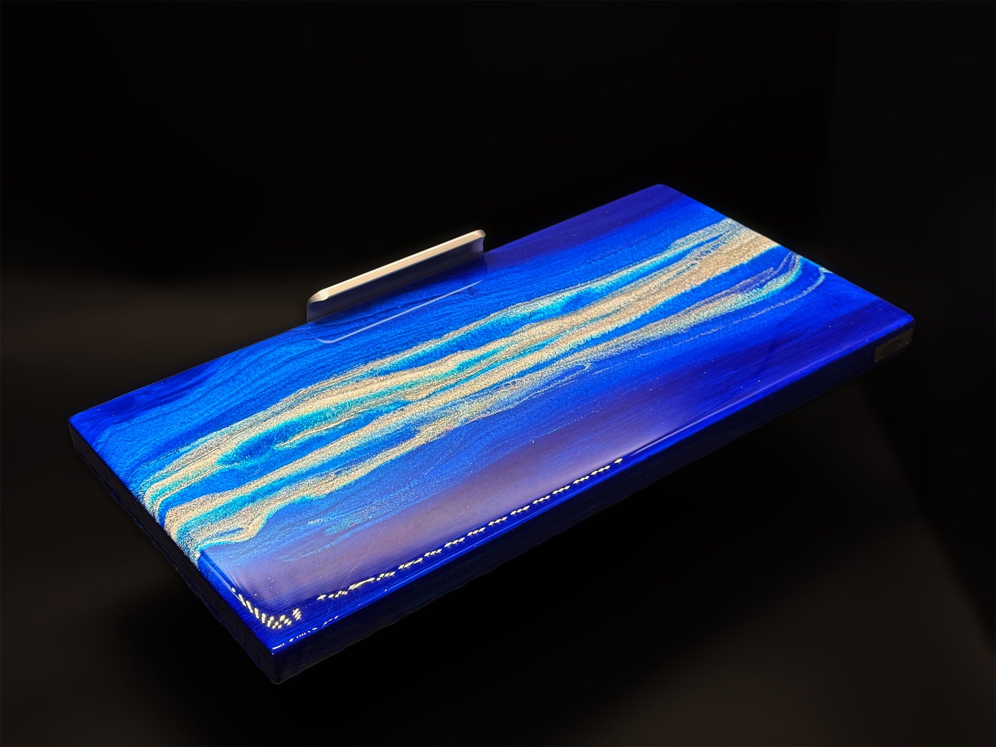 Modern furniture piece with a blue abstract waves design