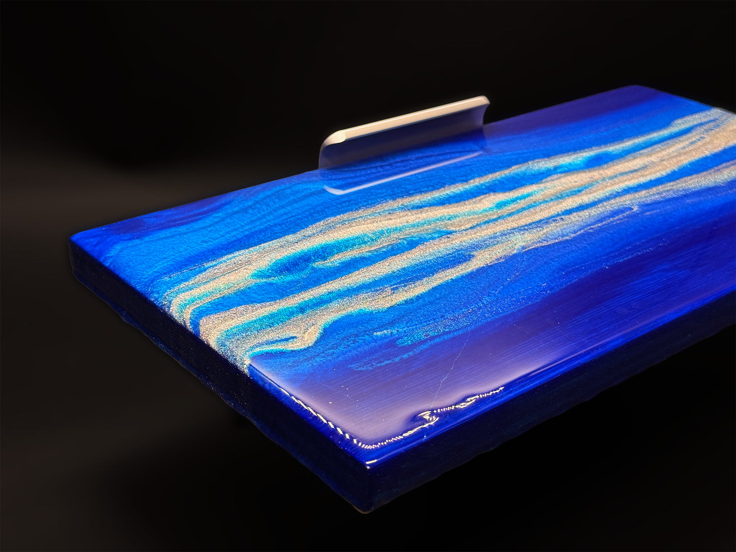 Modern furniture piece with a blue abstract waves design