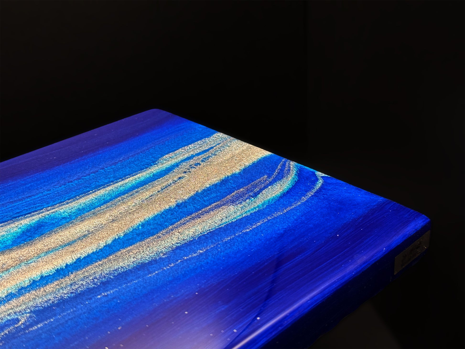 Modern furniture piece with a blue abstract waves design