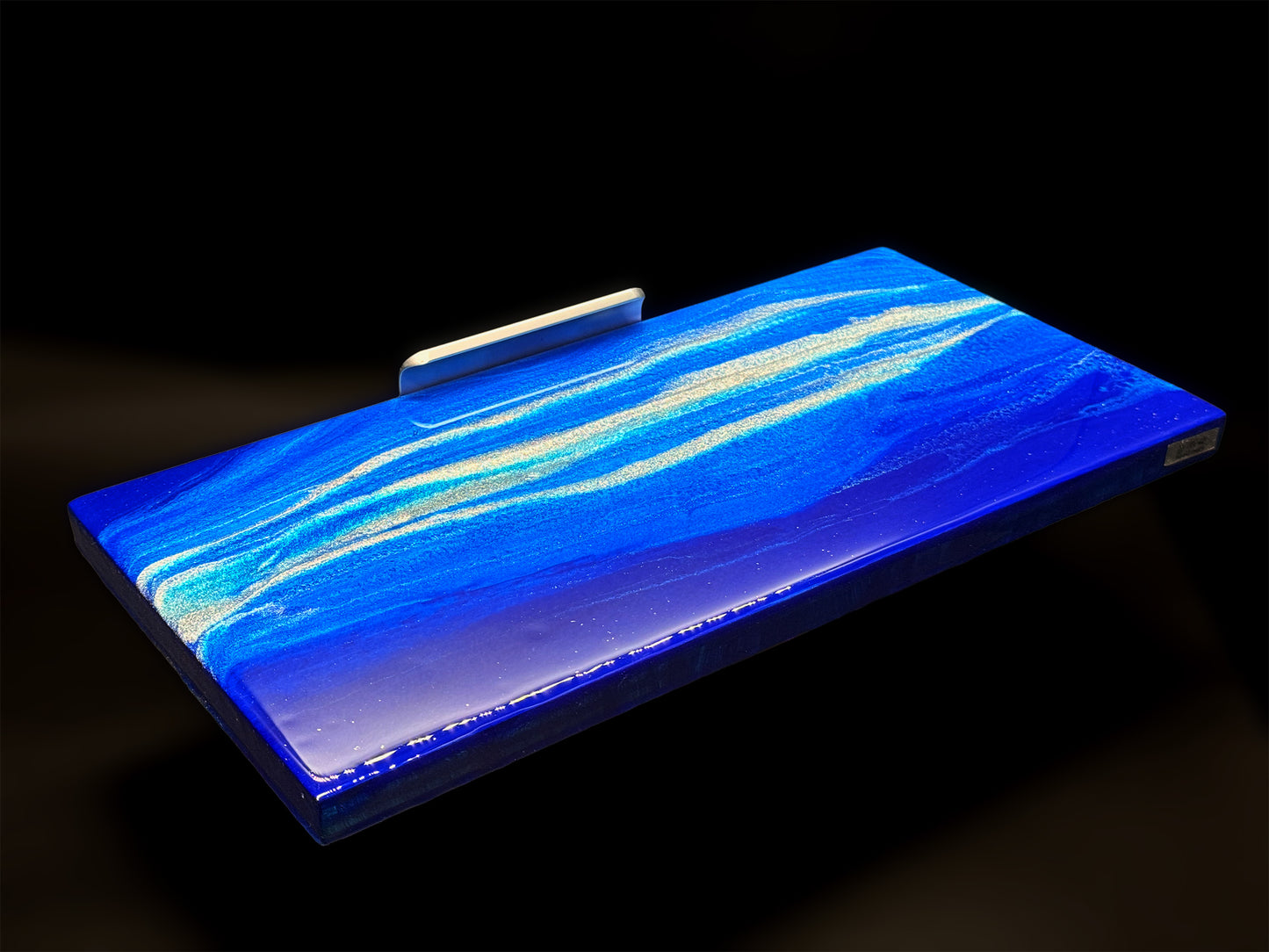 Modern furniture piece with a blue abstract waves design
