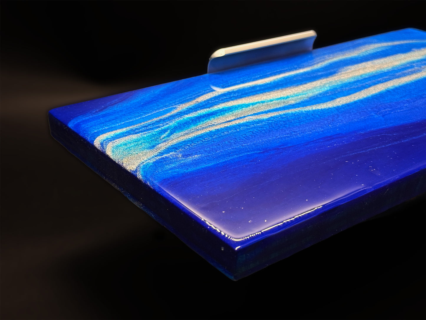 Modern furniture piece with a blue abstract waves design