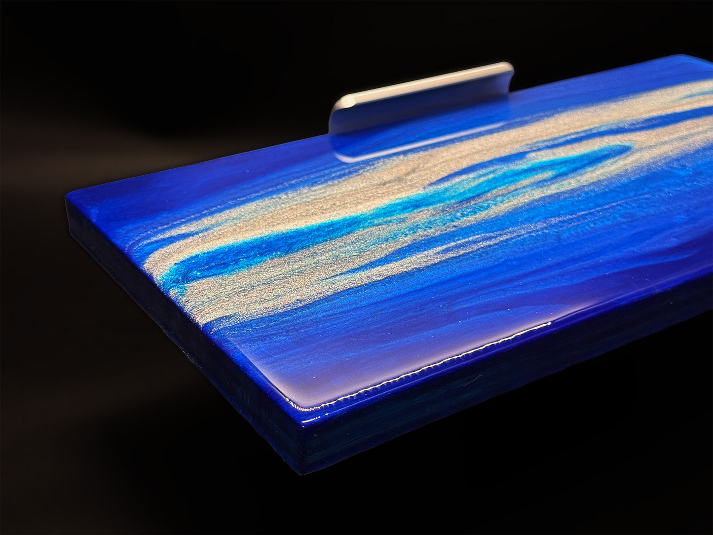 Modern furniture piece with a blue abstract waves design