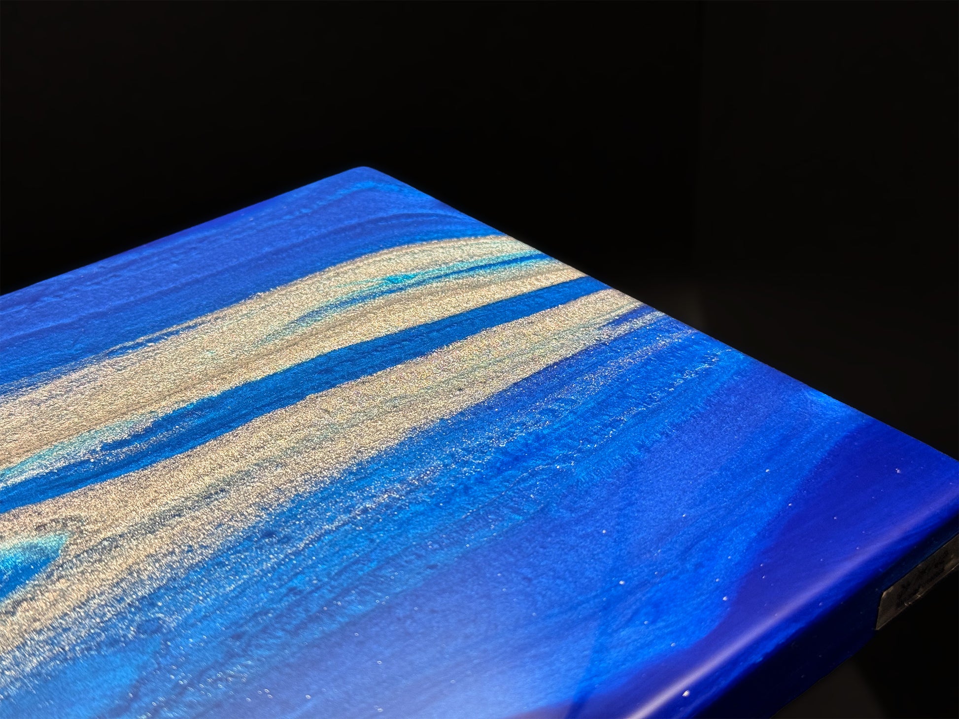 Modern furniture piece with a blue abstract waves design