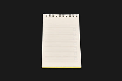 Ruled lined notepad paper on reverse