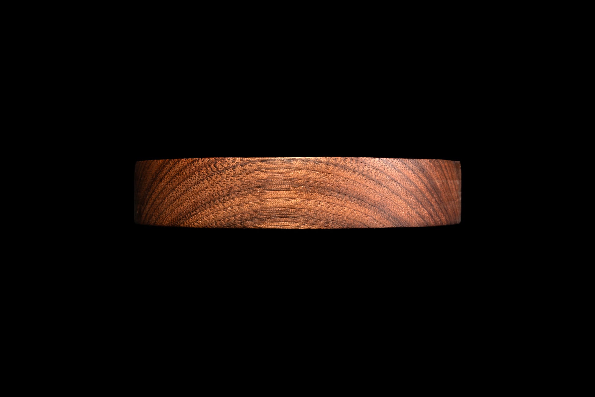 Dark circular spoon rest profile